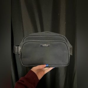 Black and silver Versace Parfums Bag